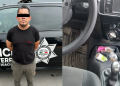Man standing with hands behind back next to a police vehicle marked 'Policia Monterrey'—suspect in custody. The vehicle displays a badge and text emphasizing investigation.